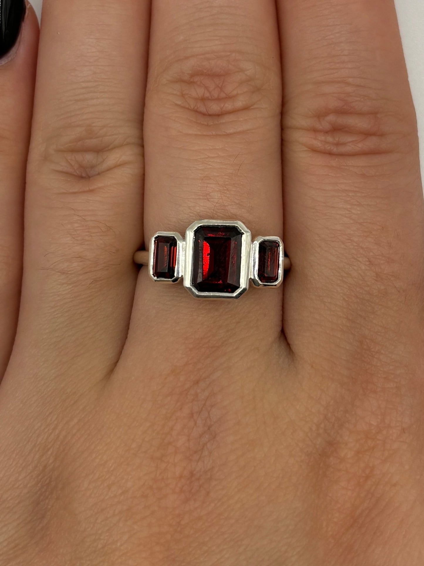 Emerald Cut Garnet Three Stone Ring